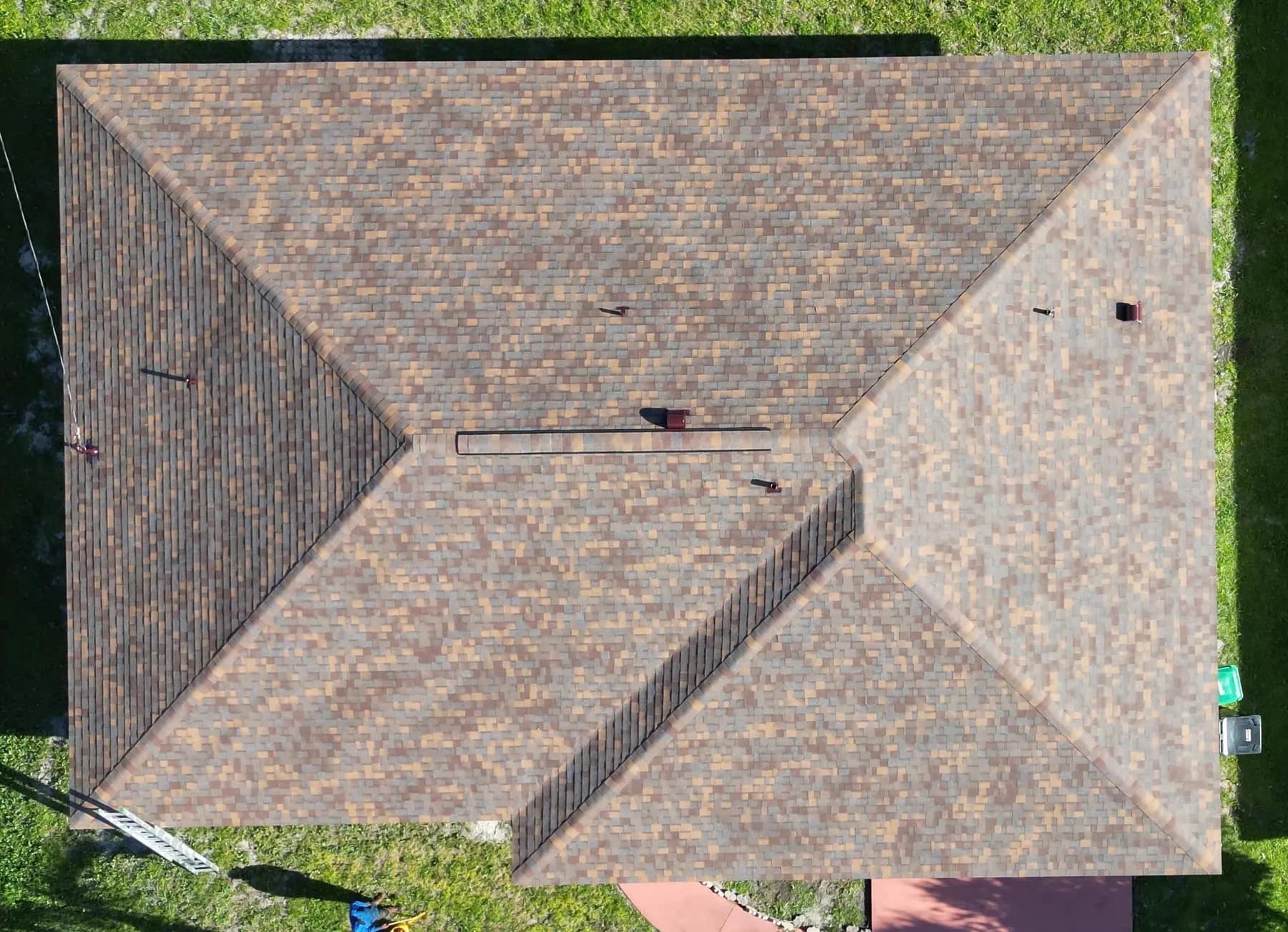 Brown architectural shingle hip roof